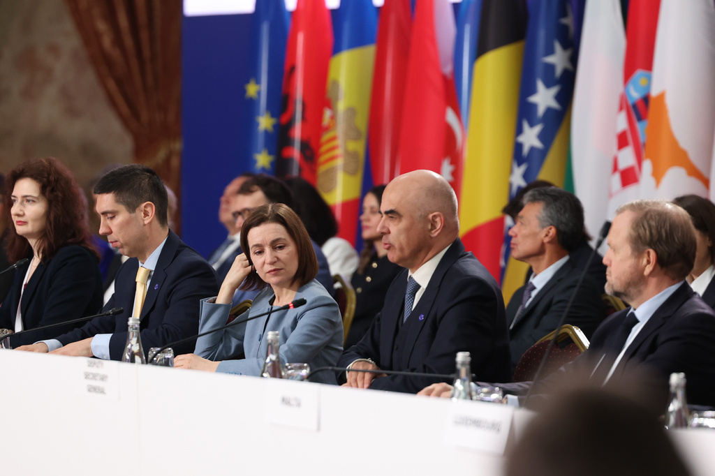 Moldova's President Maia Sandu, center, Secretary General of the Council of Europe Alain Berset, right, and Moldova's Deputy Prime Minister and Minister of Foreign Affairs Mihai Popsoi attend the 135th Ministerial Session of the Committee of Ministers of the Council of Europe in Chisinau, Moldova, Friday, May 15, 2026. (AP Photo/Elena Covalenco)