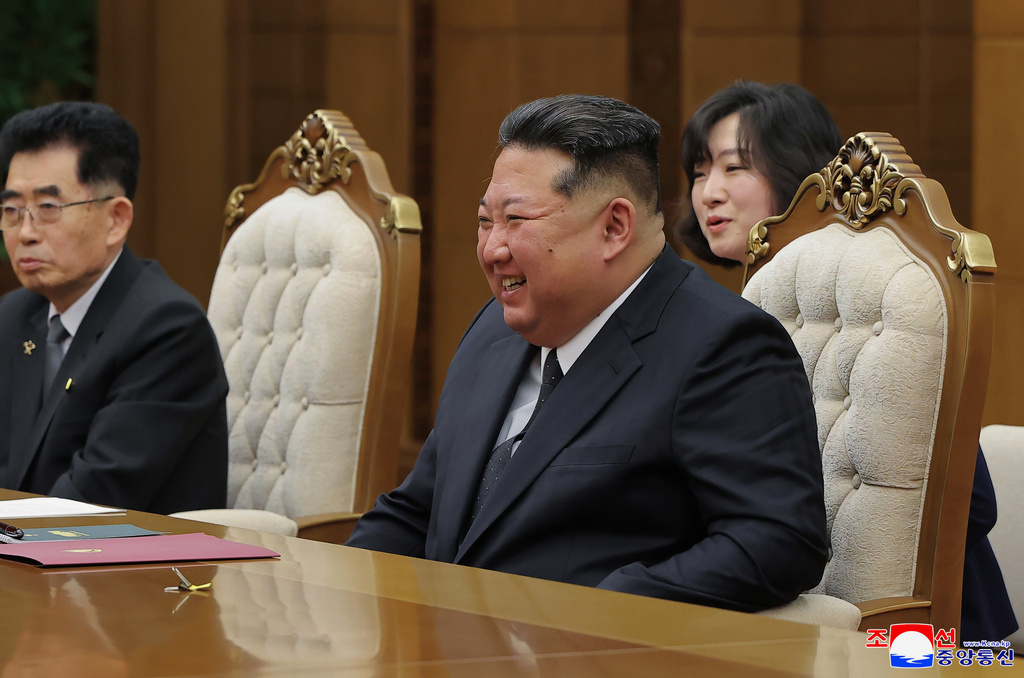 In this photo provided by the North Korean government, leader Kim Jong Un reacts as he speaks with Chinese Foreign Minister Wang Yi in Pyongyang, North Korea, Friday, April 10, 2026. Independent journalists were not given access to cover the event depicted in this image distributed by the North Korean government. The content of this image is as provided and cannot be independently verified. Korean language watermark on image as provided by source reads: "KCNA" which is the abbreviation for Korean Central News Agency. (Korean Central News Agency/Korea News Service via AP)
