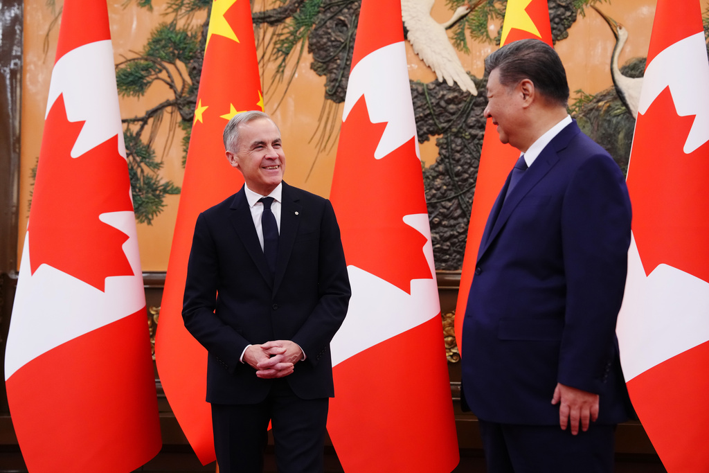 Canada's Prime Minister Mark Carney meets with President of China Xi Jinping at the Great Hall of the People in Beijing, China, Friday, Jan. 16, 2026. (Sean Kilpatrick/The Canadian Press via AP)