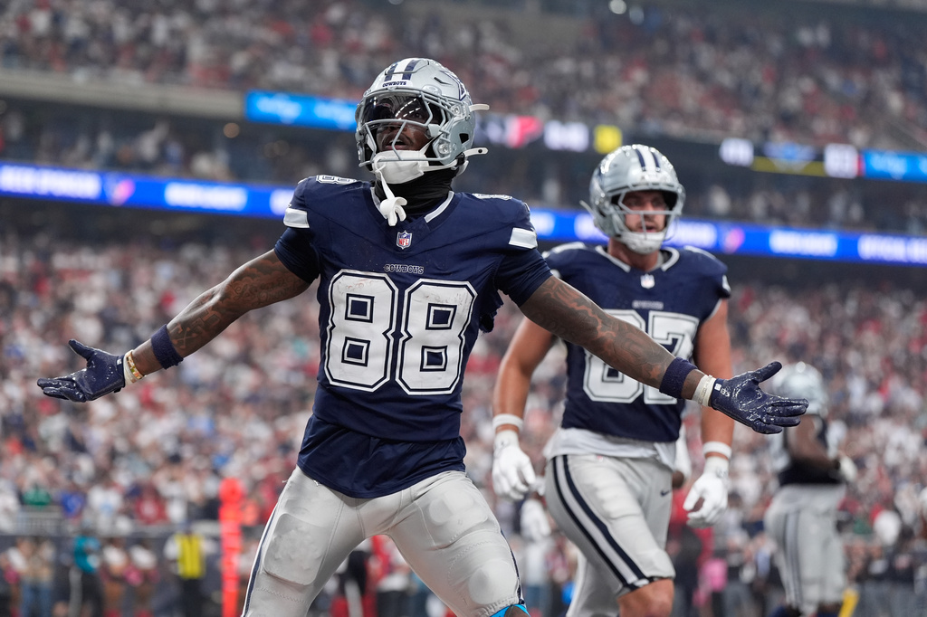 Dallas Cowboys wide receiver Ceedee Lamb celebrates his touchdown during the second half of an NFL football game against the Houston Texans in Houston, Sunday, Oct. 4, 2026. (AP Photo/Ashley Landis)