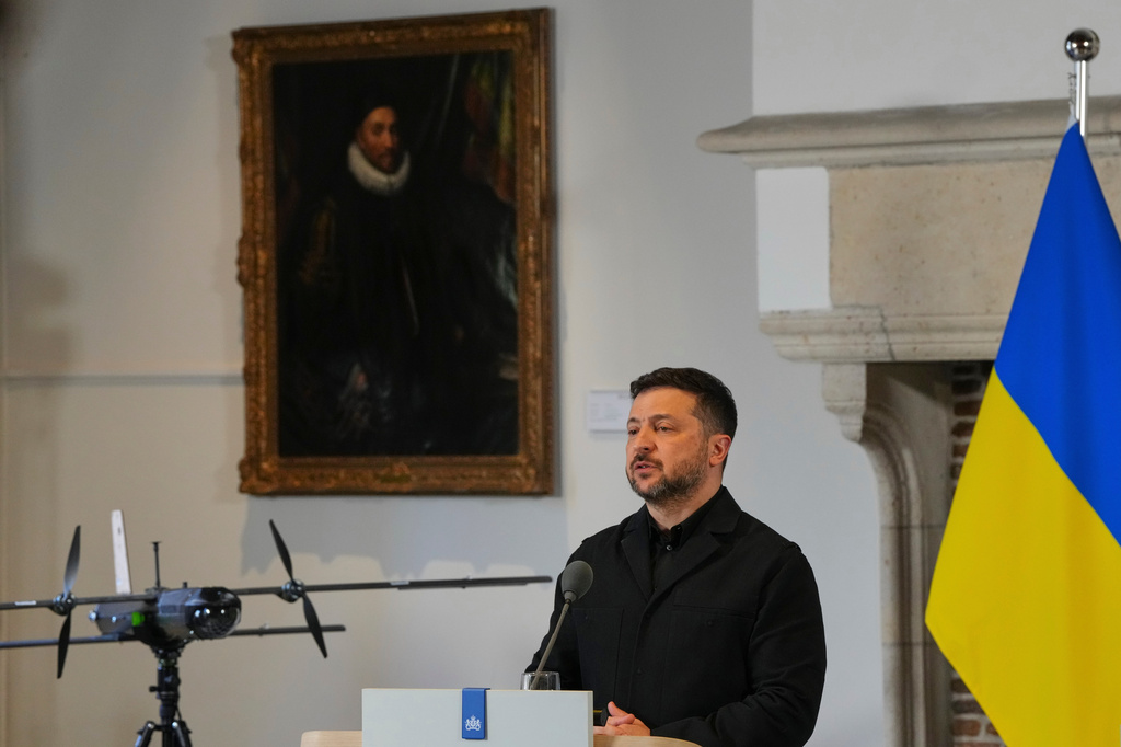 Ukraine's President Volodymyr Zelenskyy speaks next to a drone after he received the International Four Freedoms Award, in Middelburg, Netherlands, Thursday, April 16, 2026. (AP Photo/Peter Dejong)