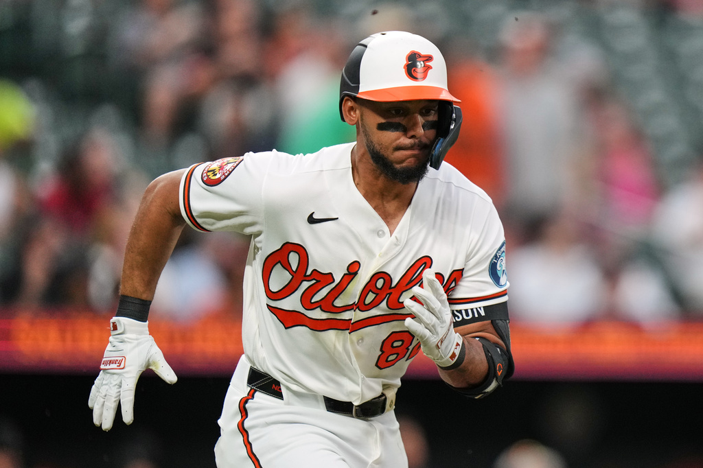 Baltimore Orioles' Jeremiah Jackson advances toward first base after hitting a single during the second inning of a baseball game against the Arizona Diamondbacks, Tuesday, April 14, 2026, in Baltimore. (AP Photo/Stephanie Scarbrough)