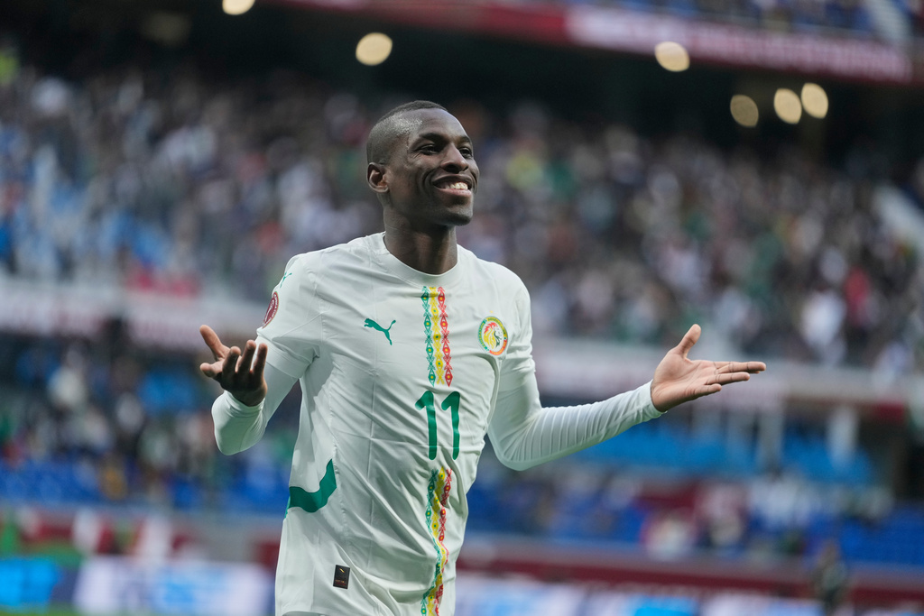 Senegal's Nicolas Jackson celebrates after scoring during the Africa Cup of Nations group D soccer match between Senegal and Botswana in Tangier, Morocco, Tuesday, Dec. 23, 2025. (AP Photo/Mosa'ab Elshamy)