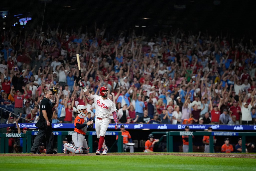 Philadelphia Phillies' Kyle Schwarber celebrates after hitting a grand slam against Houston Astros pitcher AJ Blubaugh during the sixth inning of a baseball game Wednesday, Sept. 9, 2026, in Philadelphia. (AP Photo/Matt Slocum)