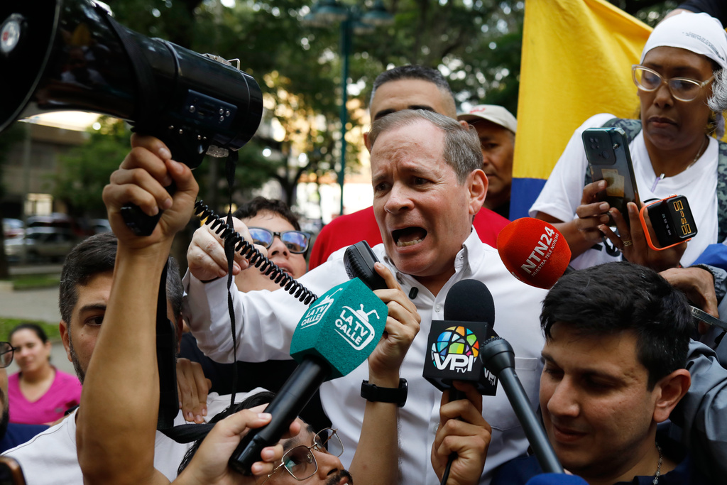Opposition leader Juan Pablo Guanipa speaks after his release from prison in Caracas, Venezuela, Sunday, Feb. 8, 2026. (AP Photo/Cristian Hernandez)