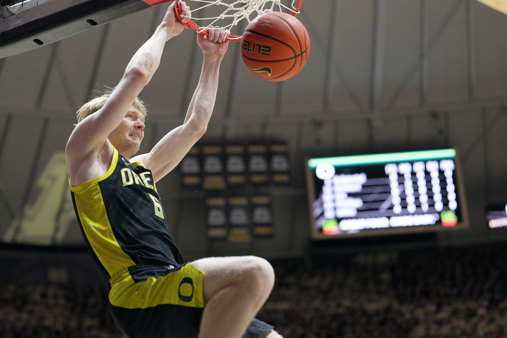 Oregon forward Oleksandr Kobzystyi (6) dunks while playing Purdue during the first half of an NCAA college basketball game in West Lafayette, Ind., Saturday, Feb. 7, 2026. (AP Photo/AJ Mast)