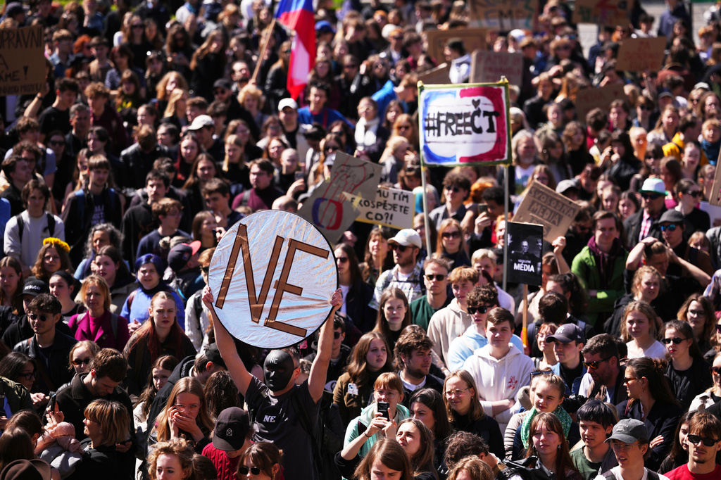 Thousands of students attend a demonstration in support of public media in Prague, Czech Republic, Wednesday, April 22, 2026. (AP Photo/Petr David Josek)