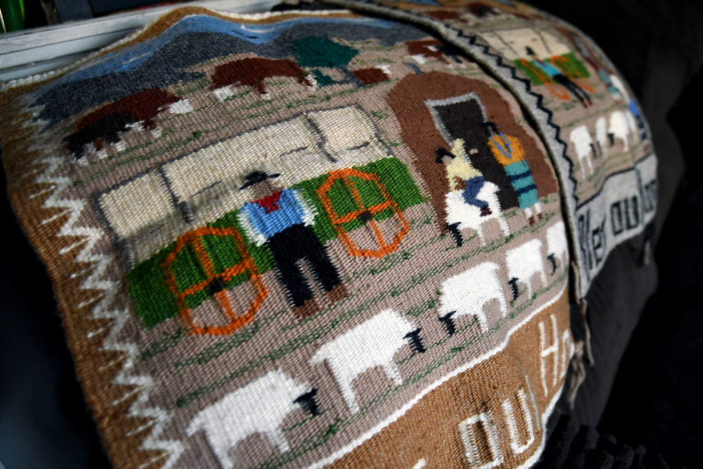 Weavings created by Ella Mae Begay, who went missing from her home, are displayed in her son's home in Denver, April 2, 2026. (AP Photo/Thomas Peipert)