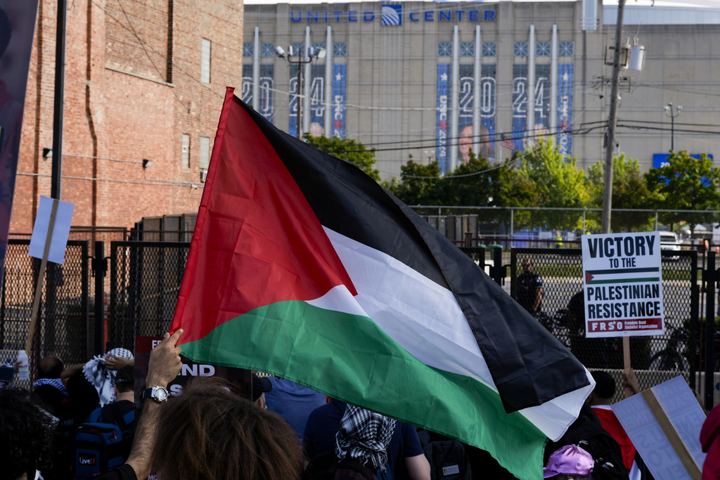 Protesters march to the Democratic National Convention at the United Center after a rally at Union Park Monday, Aug. 19, 2024, in Chicago.(AP Photo/Alex Brandon)