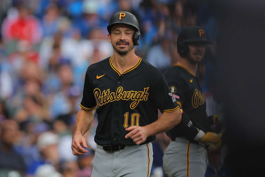 Pittsburgh Pirates' Bryan Reynolds scores on an RBI double hit by Nick Gonzales during the sixth inning of a baseball game against the Chicago Cubs, Sunday, Sept. 13, 2026, in Chicago. (AP Photo/Melissa Tamez)
