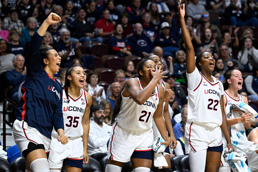 From left to right, UConn's Jana el Alfy, Azzi Fudd, Sarah Strong, and Serah Williams react in the second half of an exhibition NCAA college basketball game against Boston College, Monday, Oct. 13, 2025, in Uncasville, Conn. (AP Photo/Jessica Hill) From left to right, UConn's Jana el Alfy, Azzi Fudd, Sarah Strong, and Serah Williams react in the second half of an exhibition NCAA college basketball game against Boston College, Monday, Oct. 13, 2025, in Uncasville, Conn. (AP Photo/Jessica Hill)