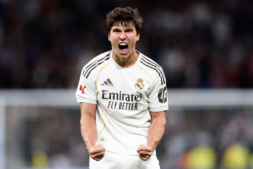 Real Madrid's Gonzalo Garcia celebrates after scoring his third and his sides fourth goal during the Spanish La Liga soccer match between Real Madrid and Real Betis Sevilla in Madrid, Spain, Sunday, Jan. 4, 2026. (AP Photo/Pablo Garcia)