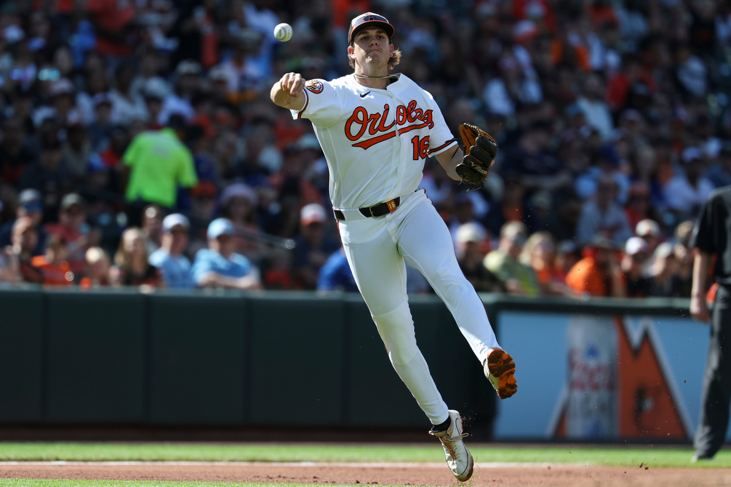 Baltimore Orioles third baseman Coby Mayo throws to first base for an out on a ball hit by Toronto Blue Jays' Ernie Clement during the second inning of a baseball game, Saturday, May 30, 2026, in Washington. (AP Photo/Terrance Williams)