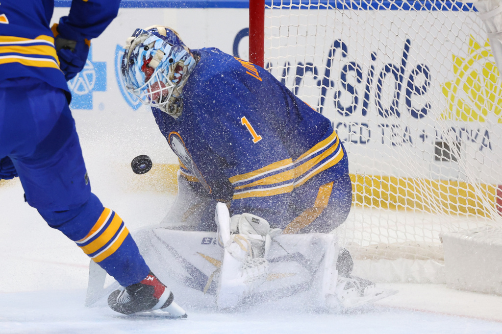 Buffalo Sabres goaltender Ukko-Pekka Luukkonen (1) makes a save in traffic during the second period of an NHL hockey game against the New York Islanders Tuesday, March 31, 2026, in Buffalo, N.Y. (AP Photo/Jeffrey T. Barnes)
