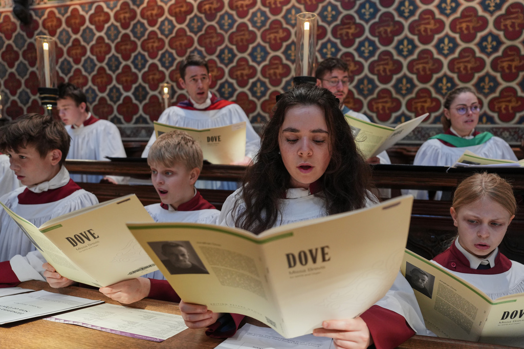 Britain Choral Music Choristers sing during Evensong at Rochester Cathedral in Rochester, England, Friday, March 27, 2026. (AP Photo/Kin Cheung)
