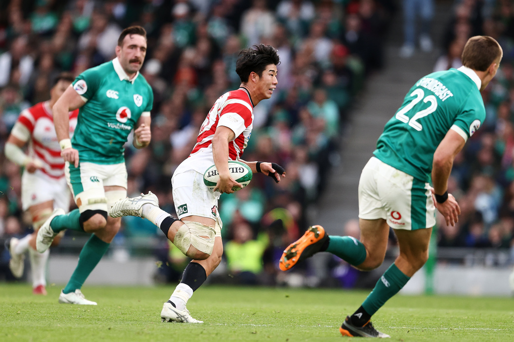 Japan's Yoshitaka Yazaki runs the ball during the rugby union Nations Series match between Ireland and Japan in Dublin, Saturday, Nov. 8, 2025 . (AP Photo/Peter Morrison)