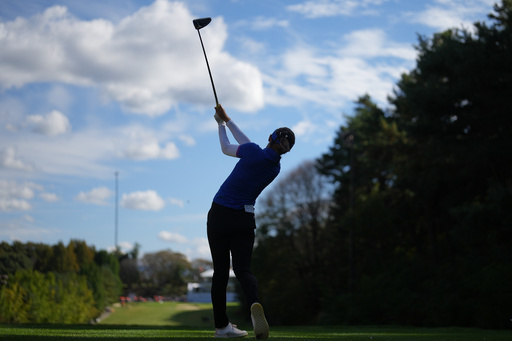 Lydia Ko of World Team tees off on the ninth hole during the pool B match against South Korea team for the LPGA International Crown golf tournament at the New Korea Country Club in Goyang, South Korea, Friday, Oct. 24, 2025. (AP Photo/Lee Jin-man) Lydia Ko of World Team tees off on the ninth hole during the pool B match against South Korea team for the LPGA International Crown golf tournament at the New Korea Country Club in Goyang, South Korea, Friday, Oct. 24, 2025. (AP Photo/Lee Jin-man)