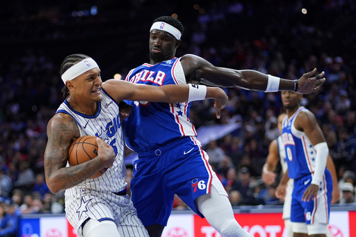 Orlando Magic's Paolo Banchero, left, tries to get past Philadelphia 76ers' Adem Bona during the first half of an NBA basketball game Monday, Oct. 27, 2025, in Philadelphia. (AP Photo/Matt Slocum) Orlando Magic's Paolo Banchero, left, tries to get past Philadelphia 76ers' Adem Bona during the first half of an NBA basketball game Monday, Oct. 27, 2025, in Philadelphia. (AP Photo/Matt Slocum)