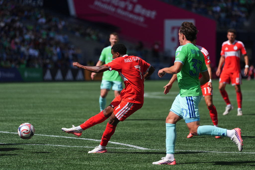 Chicago Fire FC midfielder Maren Haile-Selassie scores a goal as Seattle Sounders midfielder Snyder Brunell (37) looks on during the first half of an MLS soccer match, Saturday, Aug. 29, 2026, in Seattle. (AP Photo/Lindsey Wasson)