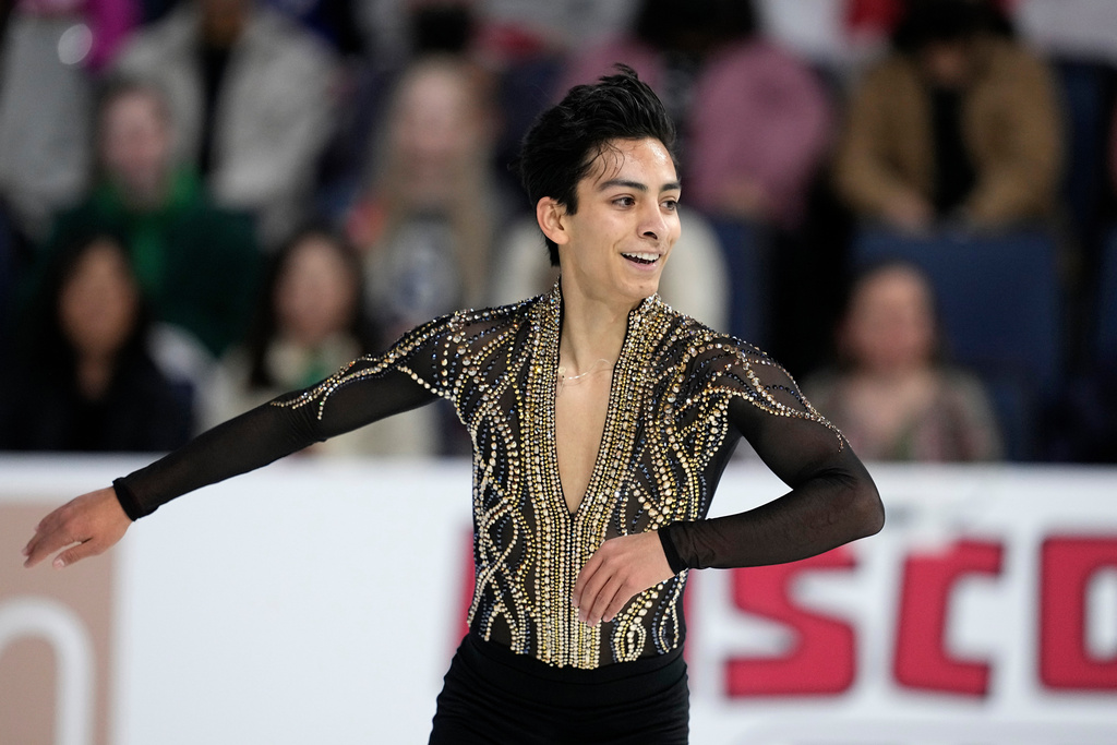 FILE - Donovan Carrillo of Mexico competes during the men's short program at the Skate America figure skating event in Allen, Texas, Oct. 19, 2024. (AP Photo/Tony Gutierrez, File)