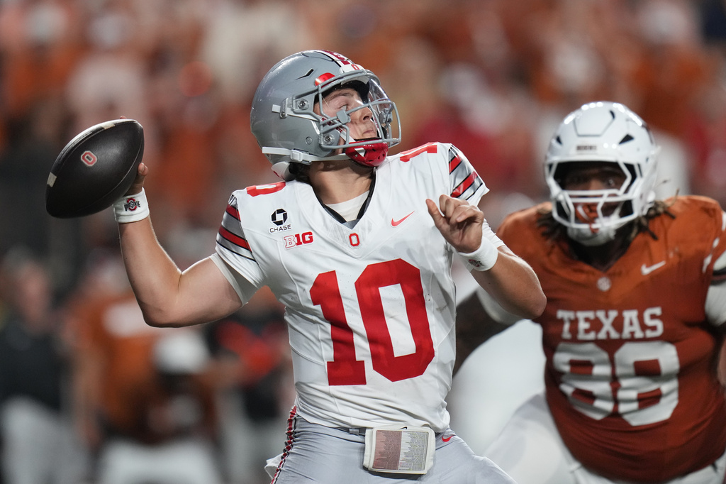 Ohio State quarterback Julian Sayin (10) throws against Texas during the first half of an NCAA college football game in Austin, Texas, Saturday, Sept. 12, 2026. (AP Photo/Eric Gay)