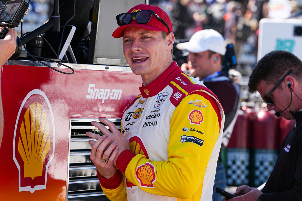 FILE - Josef Newgarden waits for the start practice for the Indianapolis 500 auto race at Indianapolis Motor Speedway in Indianapolis, Friday, May 23, 2025. (AP Photo/Michael Conroy, File)