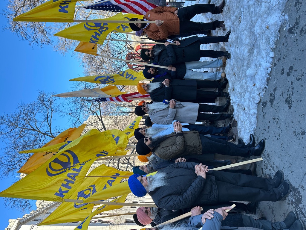 Sikhs from across the United States and Canada pray outside Manhattan federal court in New York, Friday, Feb. 13, 2026, after a man from India pleads guilty to conspiring to assassinate a New York lawyer and human rights advocate campaigning to turn Punjab, a state in northwest India, into a sovereign Sikh state to be renamed the Democratic Republic of Khalistan. (AP Photo/Larry Neumeister)