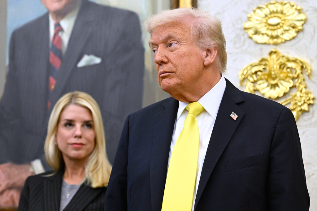 FILE - President Donald Trump and Attorney General Pam Bondi listen as FBI Director Kash Patel speaks during an event in the Oval Office at the White House, Oct. 15, 2025, in Washington. (AP Photo/John McDonnell, File)