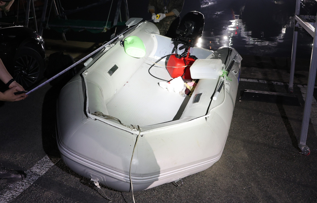 This photo provided by The Taean Maritime Police, shows the rubber boat that a Chinese national had boarded when he was detained in the waters off South Korea's west coast, at a port in Taean, South Korea, Tuesday, May 26, 2026. (The Taean Maritime Police/ via AP)