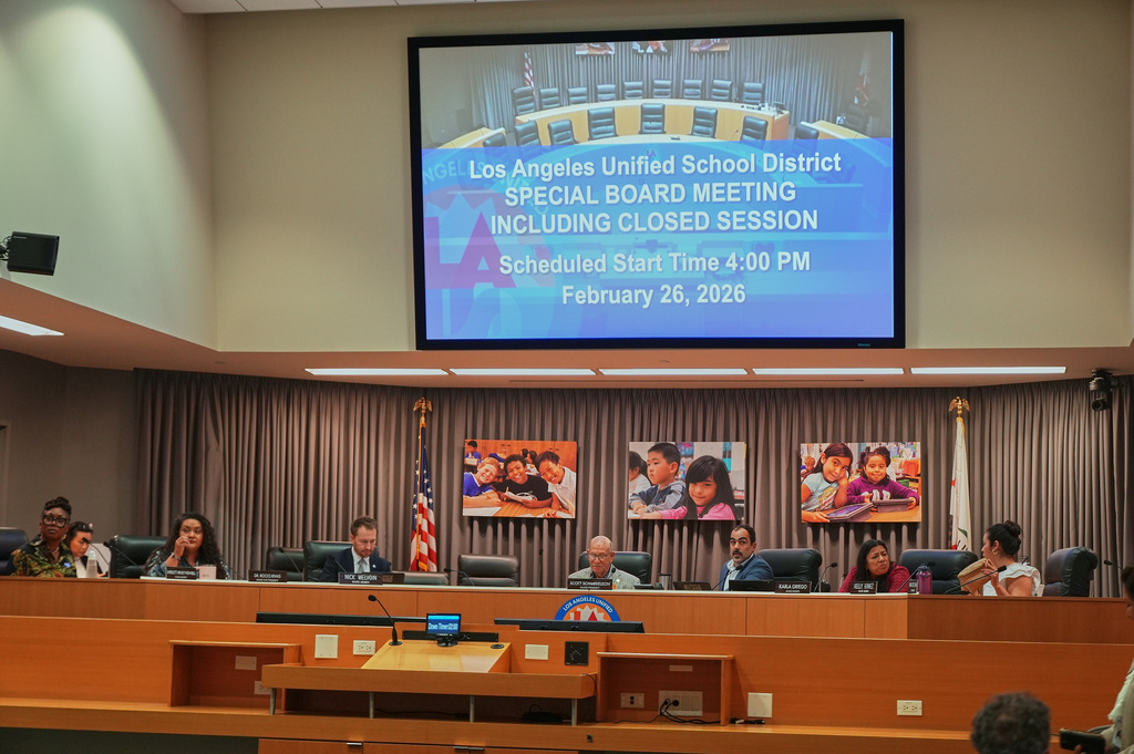 Los Angeles Unified School District board members listen to online public comments during a meeting at LAUSD headquarters before a special closed session with Superintendent Alberto Carvalho, Thursday, Feb. 26, 2026, in Los Angeles. (AP Photo/Damian Dovarganes)