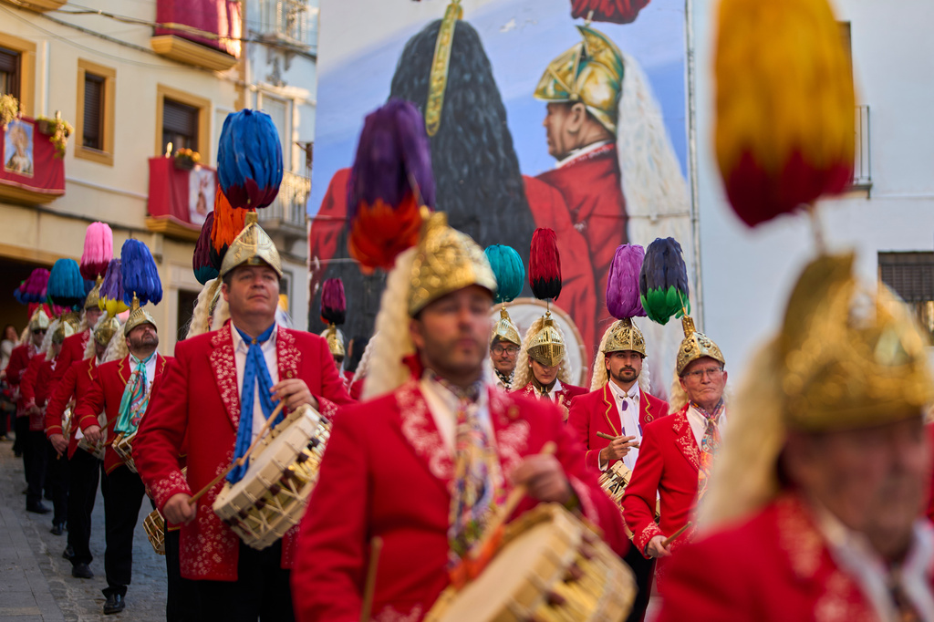 Members of the "White-tail Jews," march while playing drums alongside the Nuestro Padre Jesus del Huerto y San Diego brotherhood during a Holy Week procession in Baena, southern Spain, Wednesday, April 1, 2026. (AP Photo/Manu Fernandez)