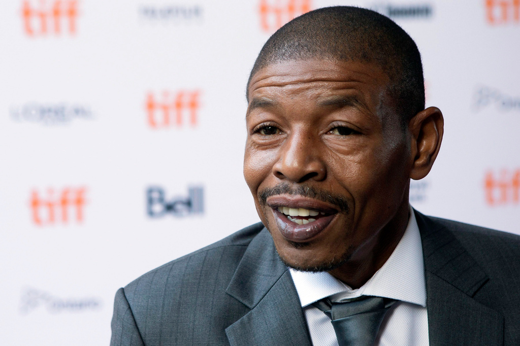 FILE - Former NBA basketball player Muggsy Bogues arrives on the red carpet for the film "Giants of Africa" during the 2016 Toronto International Film Festival on Friday, Sept. 16, 2016. (Chris Young/The Canadian Press via AP, File)