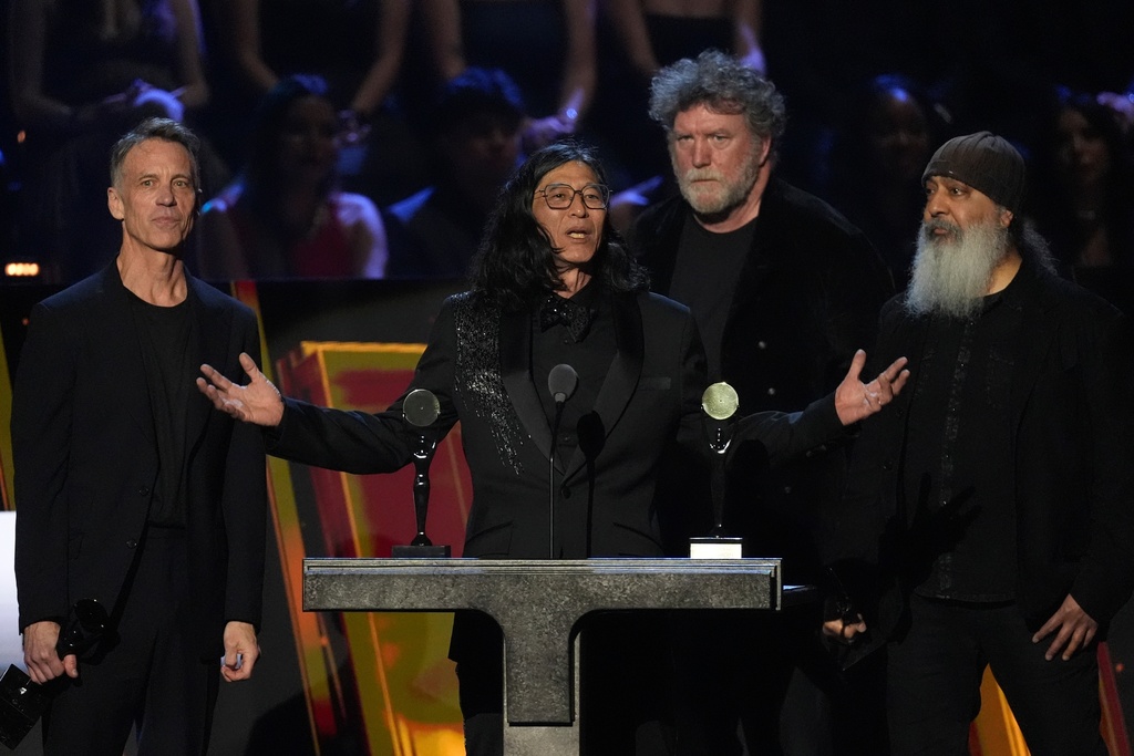 Matt Cameron, from left, Hiro Yamamoto, Ben Shepherd, and Kim Thayil of Soundgarden speak during the 2025 Rock and Roll Hall of Fame Induction Ceremony on Saturday, Nov. 8, 2025, at L.A. Live in Los Angeles. (AP Photo/Chris Pizzello)