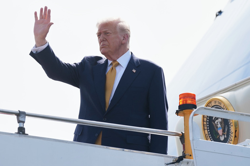 President Donald Trump waves as he boards Air Force One at Kuala Lumpur International Airport in Sepang, Malaysia, as he departs for Japan, Monday, Oct. 27, 2025. (AP Photo/Mark Schiefelbein) President Donald Trump waves as he boards Air Force One at Kuala Lumpur International Airport in Sepang, Malaysia, as he departs for Japan, Monday, Oct. 27, 2025. (AP Photo/Mark Schiefelbein)