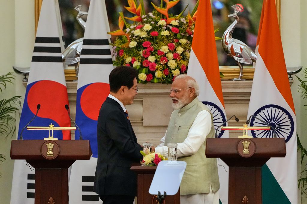 India Prime Minister Narendra Modi shakes hand with South Korean President Lee Jae Myung, left, after the signing of memorandum of understanding and agreements between their countries in New Delhi, India, Monday, April 20, 2026. (AP Photo/Manish Swarup)