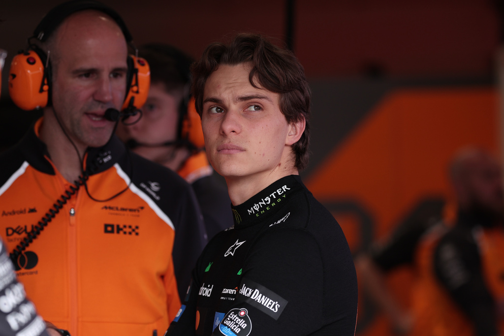 McLaren driver Oscar Piastri of Australia stands in the pit during a practice session for the Brazilian Formula One Grand Prix auto race at Interlagos race track in Sao Paulo, Friday, Nov. 7, 2025. (AP Photo/Ettore Chiereguini)