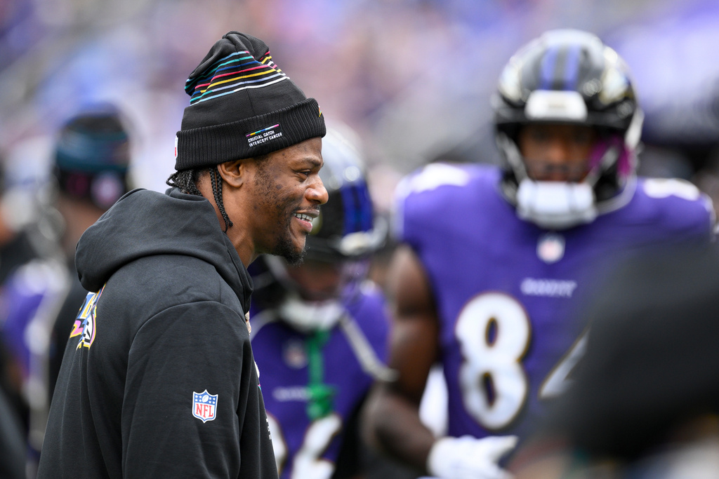 Baltimore Ravens quarterback Lamar Jackson walks on the sideline during the first half of an NFL football game against the Los Angeles Rams Sunday, Oct. 12, 2025, in Baltimore. (AP Photo/Nick Wass)