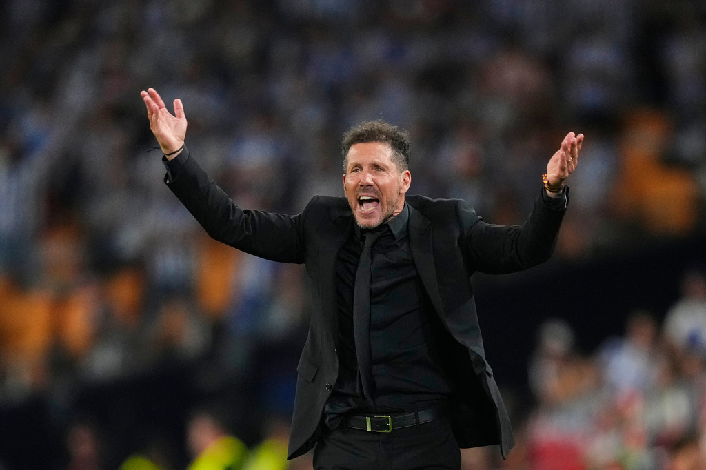 Atletico Madrid's head coach Diego Simeone reacts during the Copa del Rey final soccer match between Atletico Madrid and Real Sociedad in Seville, Spain, Saturday, April. 18, 2026. (AP Photo/Jose Breton)