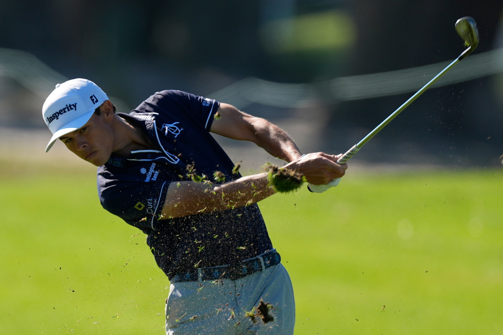 John Keefer hits from the first fairway during the final round of the RSM Classic golf tournament, Sunday, Nov. 23, 2025, in St. Simons Island, Ga. (AP Photo/Mike Stewart)