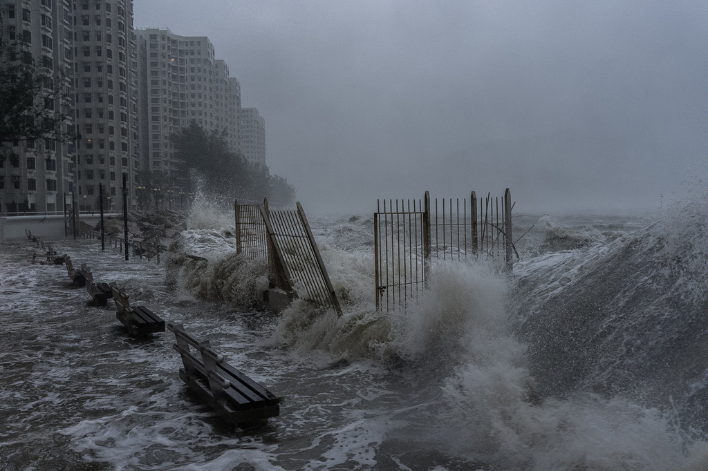 Strong waves crash against the waterfront in Heng Fa Chuen area as Super Typhoon Ragasa approaches in Hong Kong, Wednesday, Sept. 24, 2025. (AP Photo/Chan Long Hei)