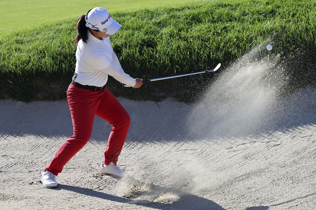 Sei Young Kim, of South Korea, hits out of a sand trap on the 15th hole during the final round of the FM Championship LPGA golf tournament at TPC Boston, Sunday, Aug. 31, 2025, in Norton, Mass. (AP Photo/Michael Dwyer)