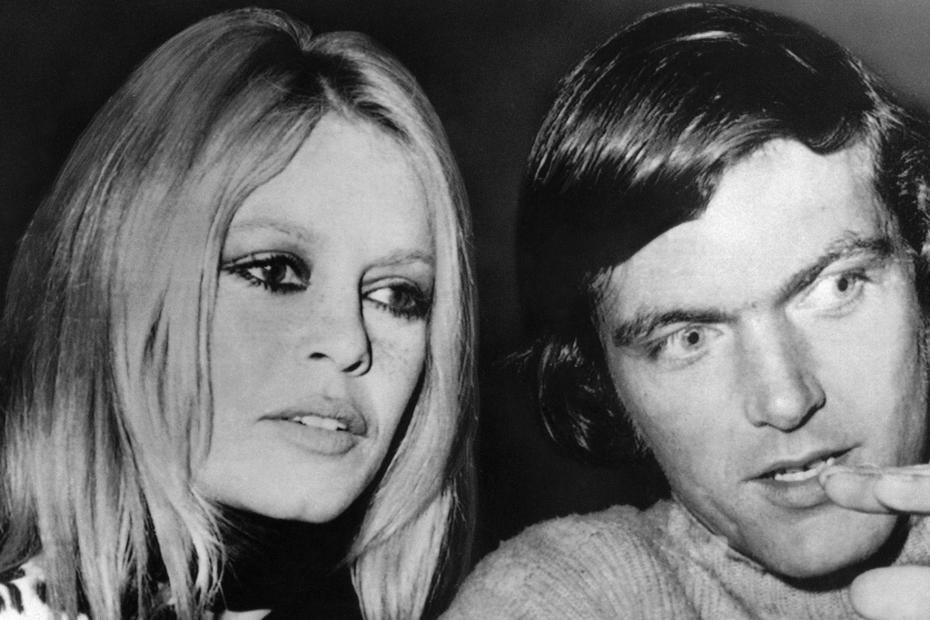 FILE - Brigitte Bardot and Patrick Gilles arrive for the premier of the film "Bullitt" in Paris, March 28, 1969. ( AP Photo/ Jean Jacques Levy, File)