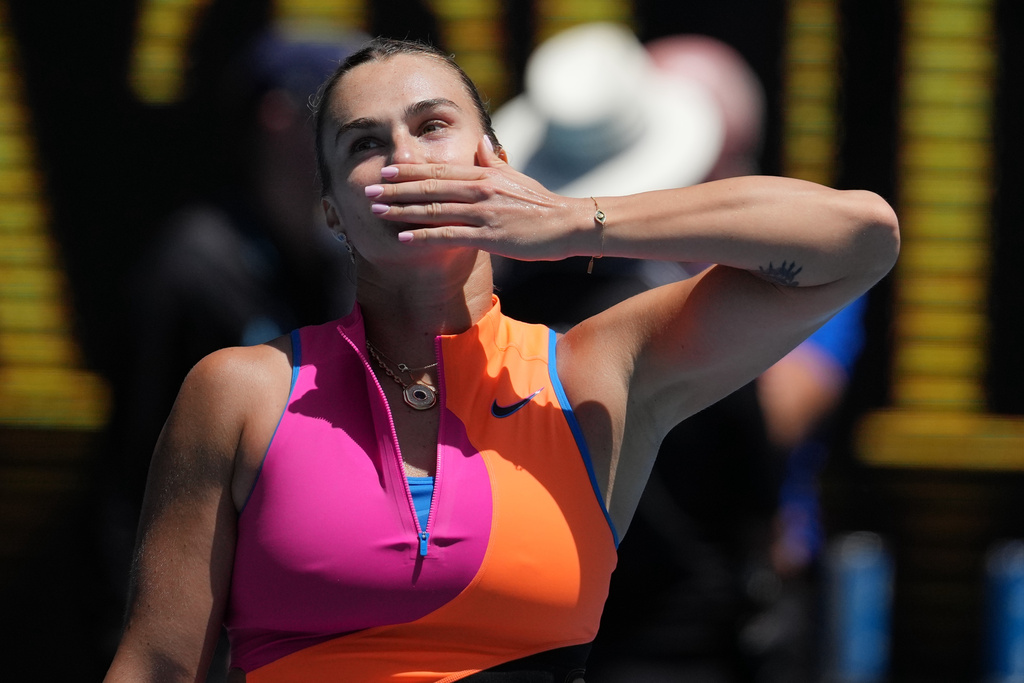 Aryna Sabalenka of Belarus celebrates after defeating Victoria Mboko of Canada in their fourth round match at the Australian Open tennis championship in Melbourne, Australia, Sunday, Jan. 25, 2026. (AP Photo/Dita Alangkara)