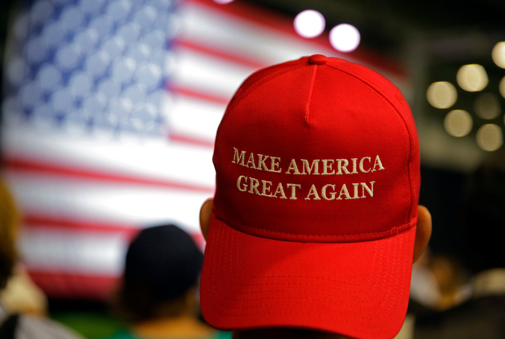 FILE - Supporters of Republican presidential candidate Donald Trump wait for the start of a rally in Westfield, Ind., July 12, 2016. (AP Photo/Michael Conroy, File)