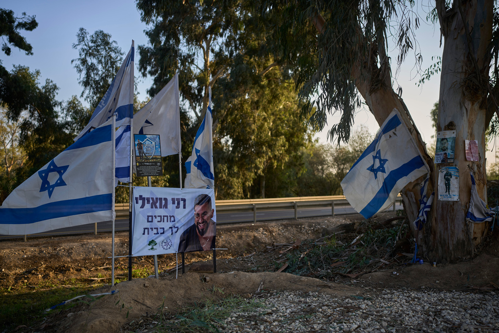 FILE - A memorial site at the spot where Ran Gvili, the last hostage in the Gaza Strip, was killed while fighting Hamas militants, stands in Kibbutz Alumim, Israel, Dec. 4, 2025. (AP Photo/Ohad Zwigenberg, File)