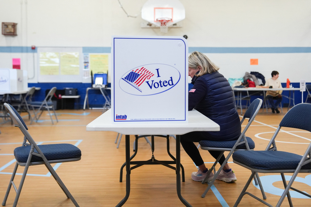 A person votes in the Virginia redistricting referendum at Lyles-Crouch Traditional Academy, Tuesday, April 21, 2026, in Alexandria, Va. (AP Photo/Julia Demaree Nikhinson)