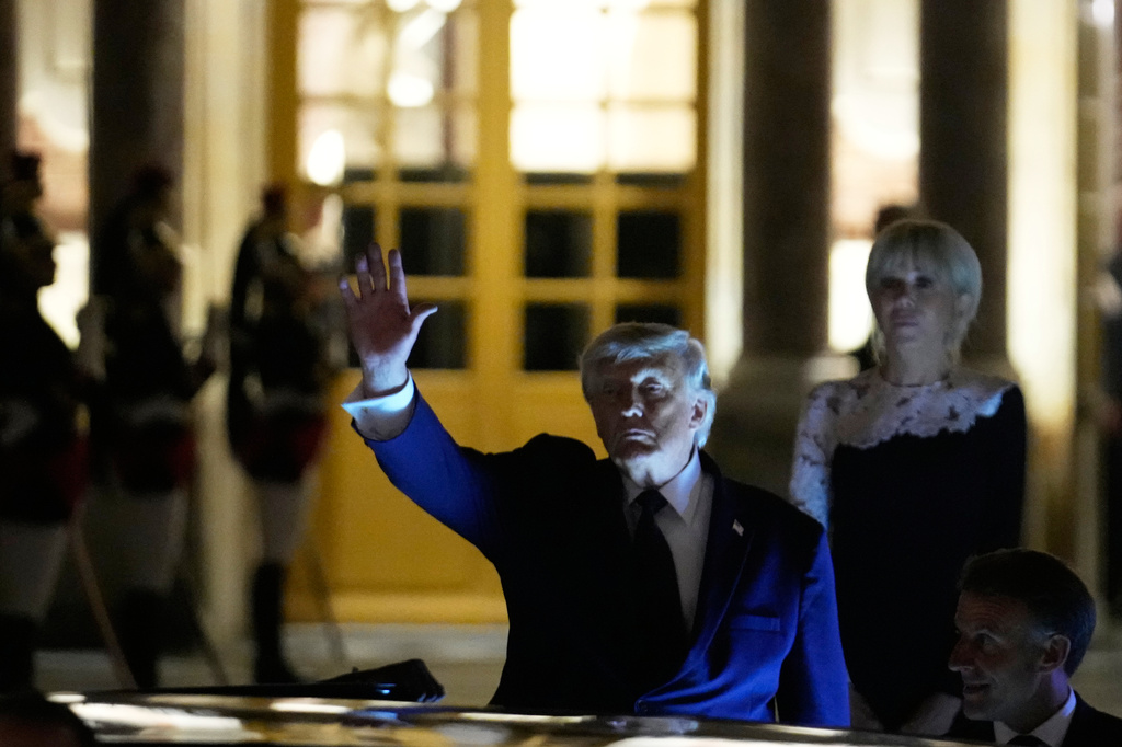 U.S. President Donald Trump departs after the dinner at the Palace of Versailles, early Thursday, June 18, 2026, in Versailles, France. (AP Photo/Michel Euler, Pool)