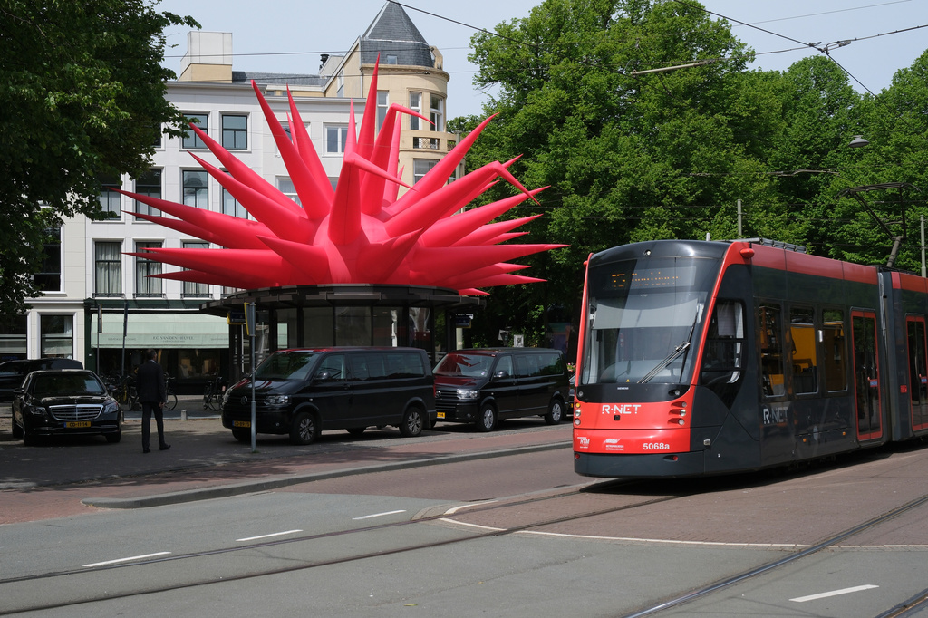A tram passes by an art installation titled Crested by Steve Messam as part of the BlowUp Jubilee Art walk in the Hague, Netherlands, Thursday, May 21, 2026. (AP Photo/Patrick Post)