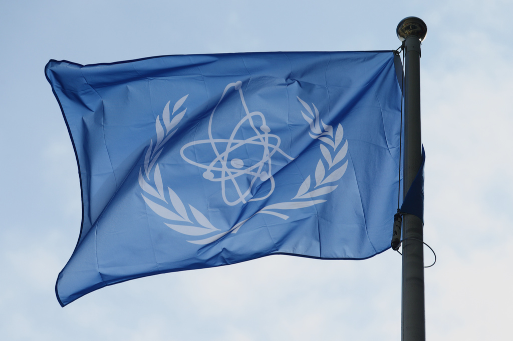 FILE - The International Atomic Energy Agency (IAEA) flag flies during a special session of an IAEA Board of Governors meeting in Vienna, Austria, March 2, 2026. (AP Photo/Heinz-Peter Bader, File)