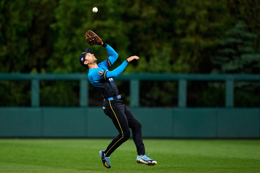 Philadelphia Phillies shortstop Trea Turner catches a fly out by Cleveland Guardians' Petey Halpin during the sixth inning of a baseball game Friday, May 22, 2026, in Philadelphia. (AP Photo/Matt Slocum)